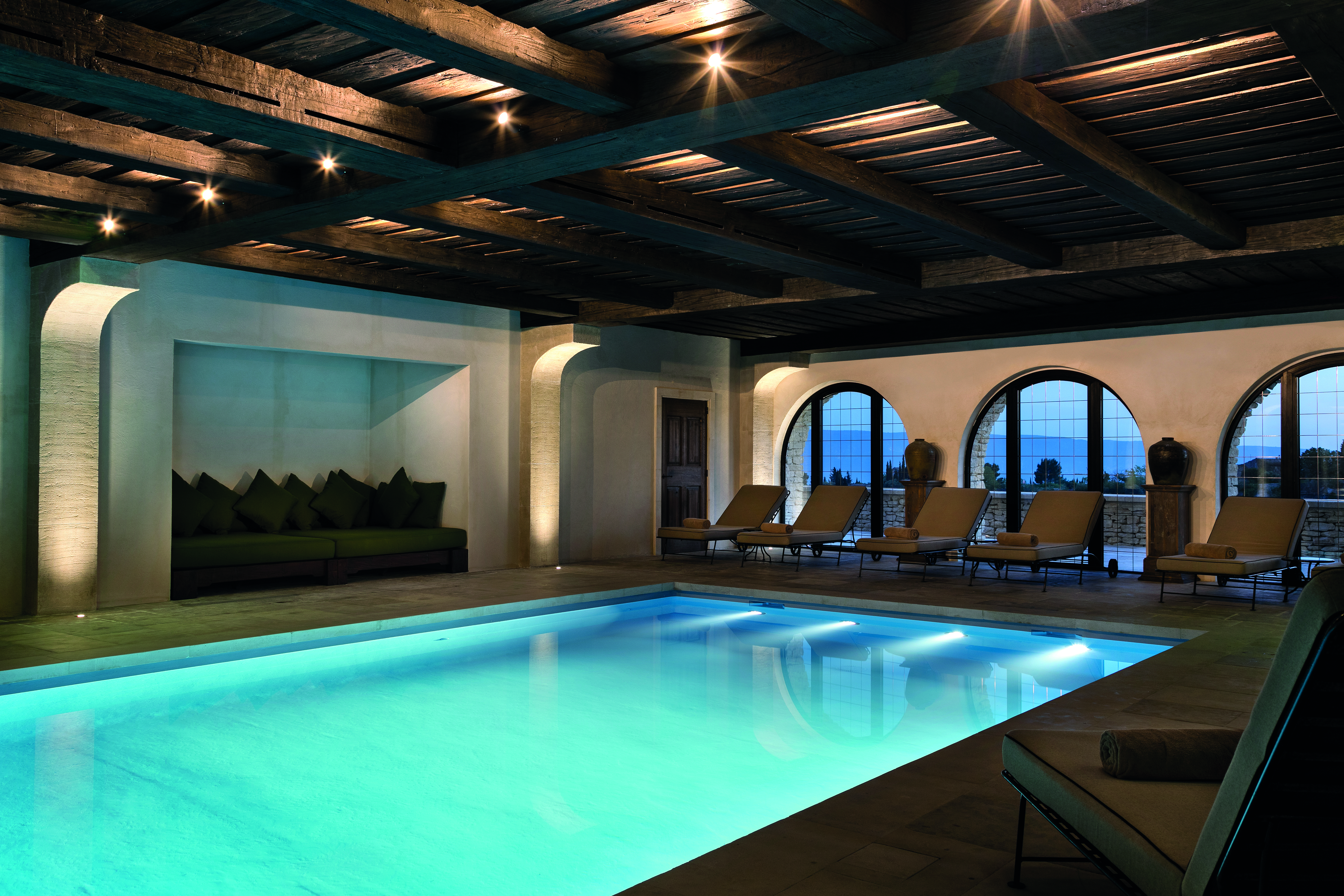 La Bastide de Gordes Provence spa swimming pool sun loungers and large windows 
