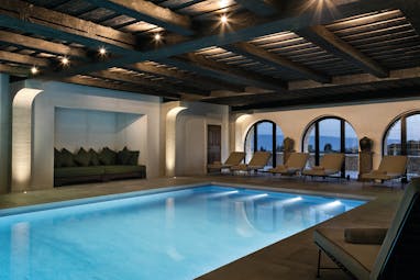 La Bastide de Gordes Provence spa swimming pool sun loungers and large windows 