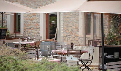 Chateau de Berne Provence bistro patio outdoor dining area umbrellas