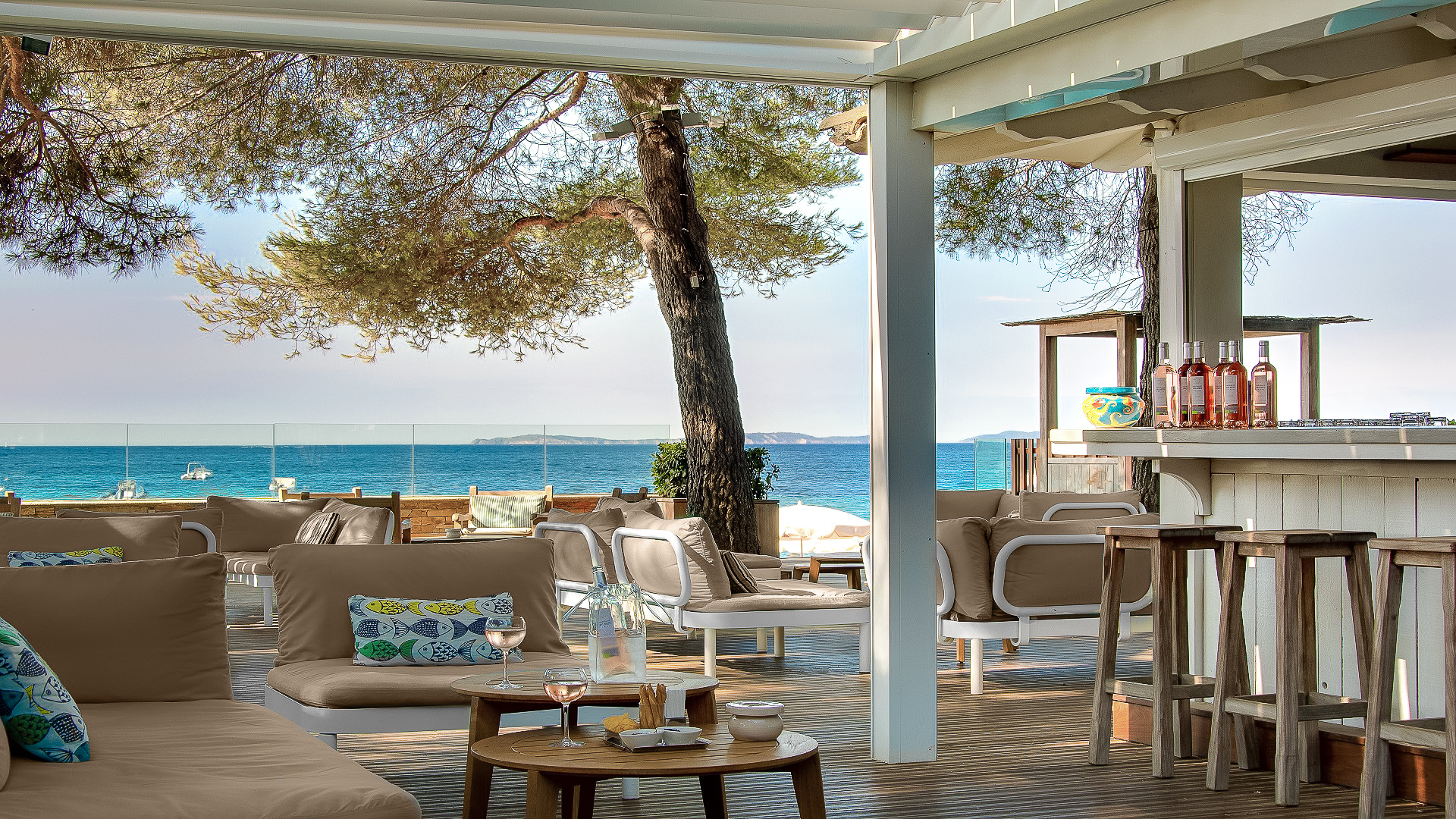 Bar near beach open air with pale furniture at Pinede Plage