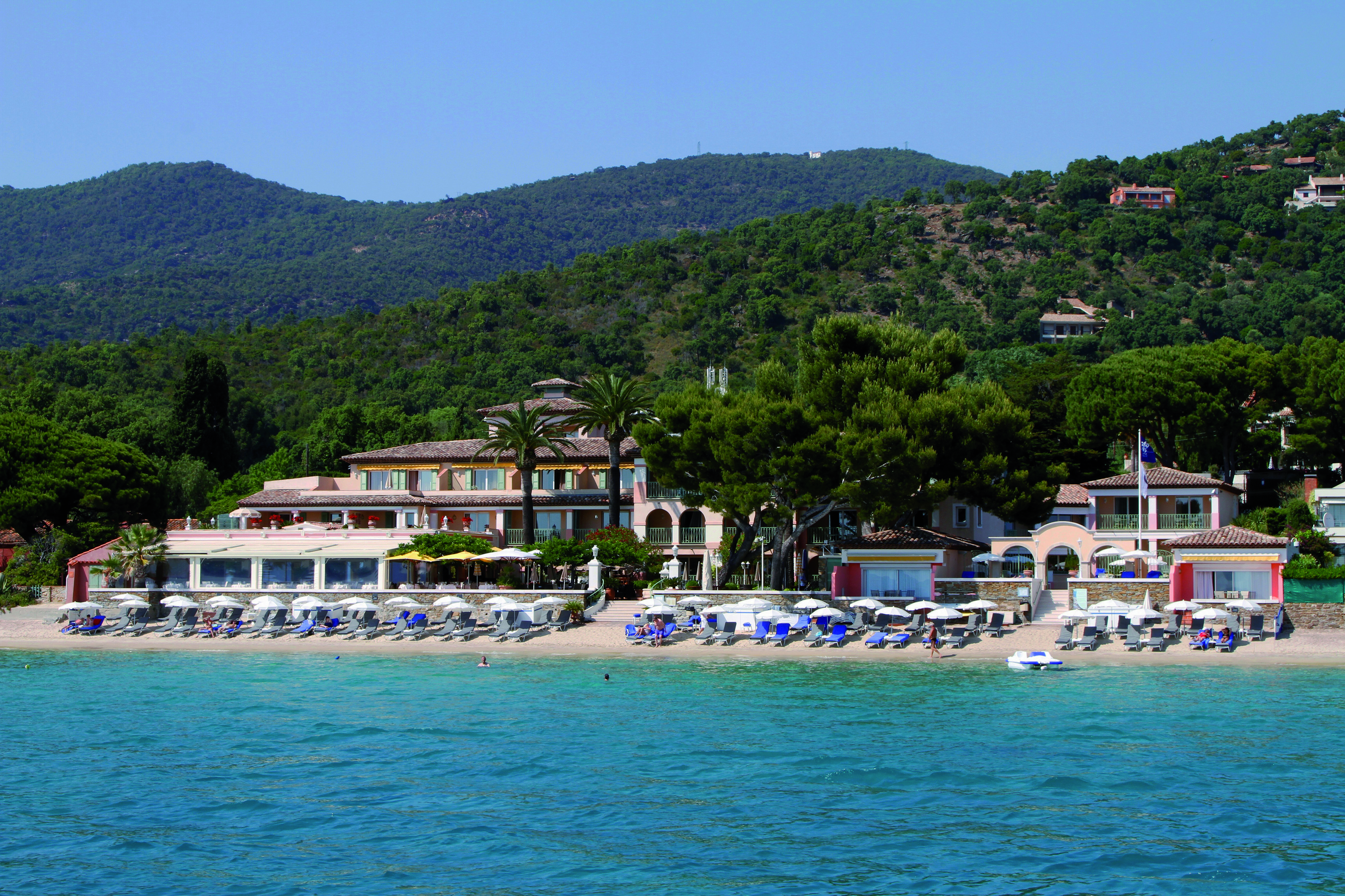 Le Club de Cavaliere Provence exterior beach view of beachside hotel sun loungers and sea