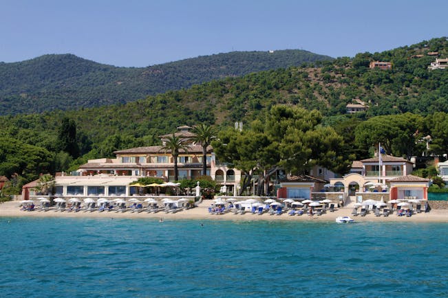 Le Club de Cavaliere Provence exterior beach view of beachside hotel sun loungers and sea