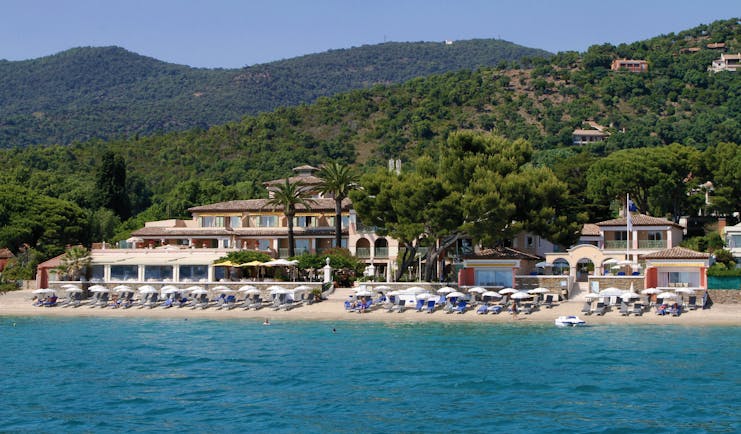 Le Club de Cavaliere Provence exterior beach view of beachside hotel sun loungers and sea