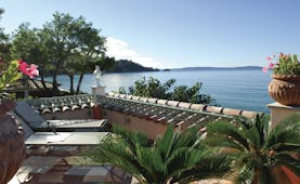 Le Club de Cavaliere Provence terrace with sun loungers overlooking the sea