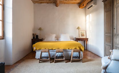 Le Galinier bed in white-walled Superior room