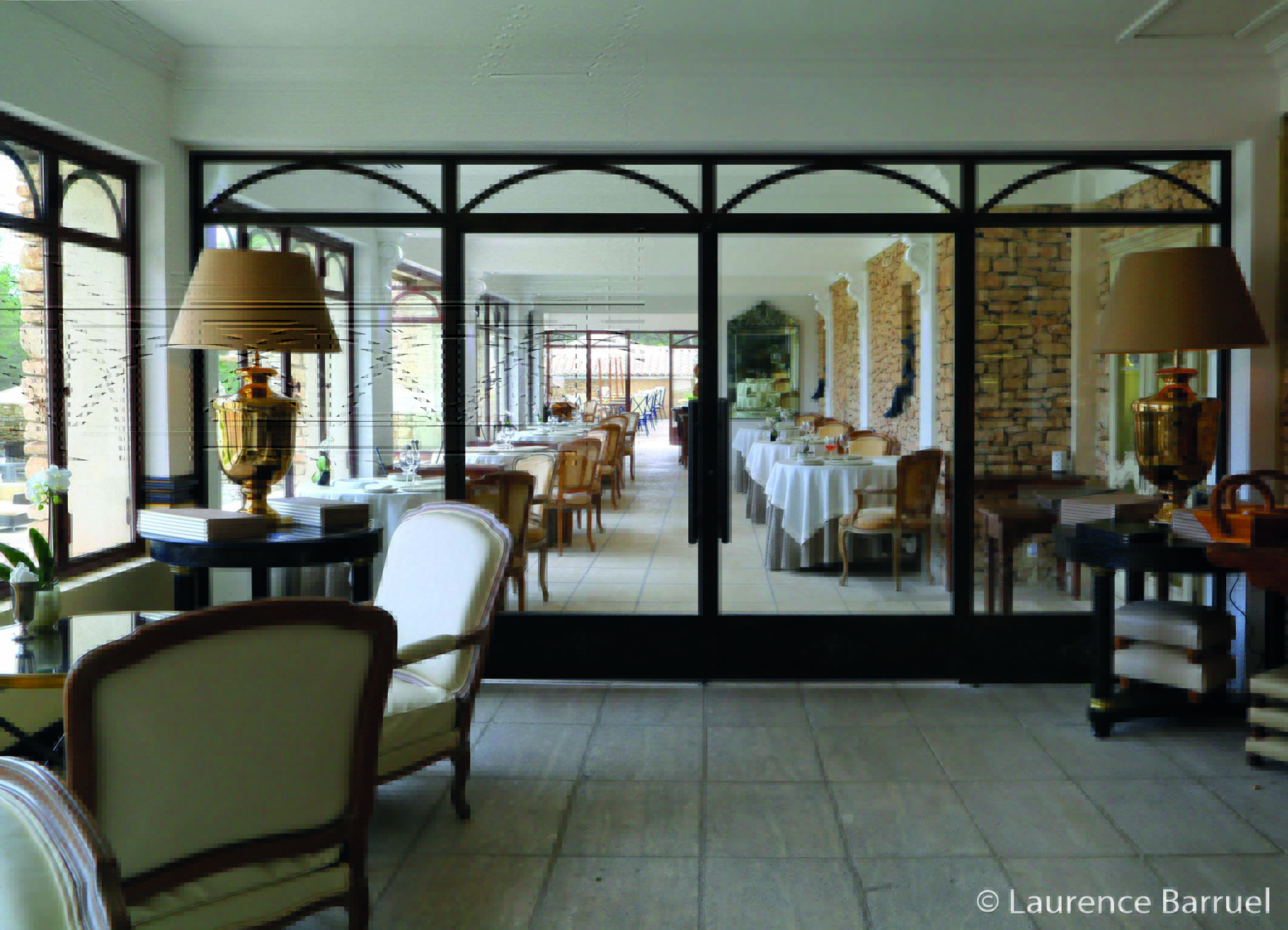 Extension of restaurant dining area with tables and chairs set up for dining