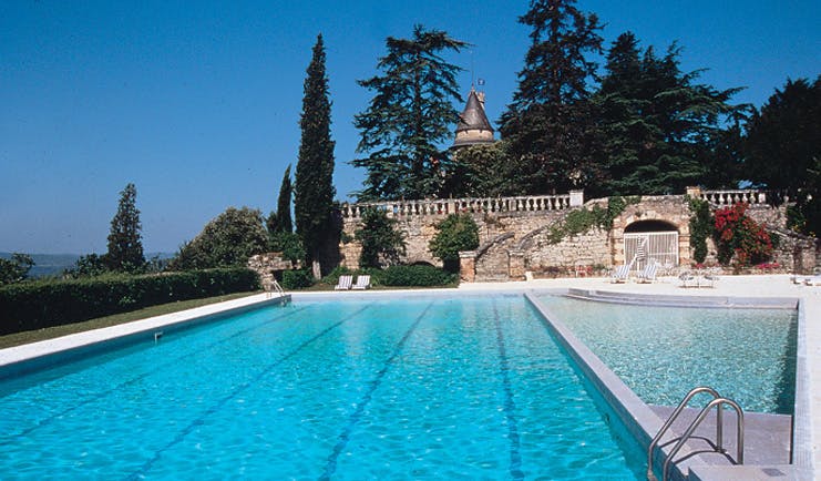 Chateau de Mercues Tarn and Lot outdoor pool with view of castle