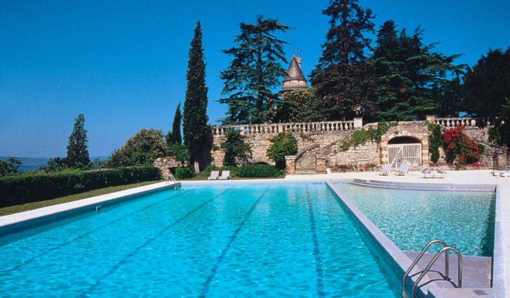 Chateau de Mercues Tarn and Lot outdoor pool with view of castle