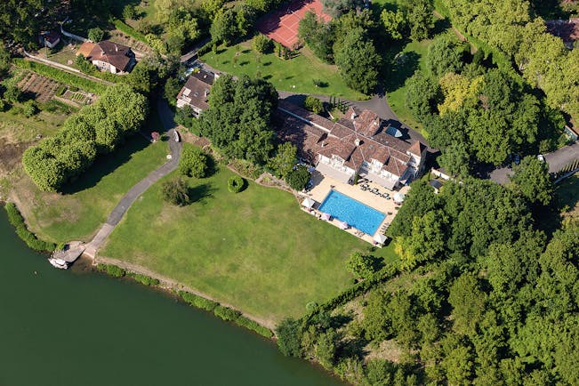 La Reserve Tarn and Lot aerial pool view and lawn next to a river