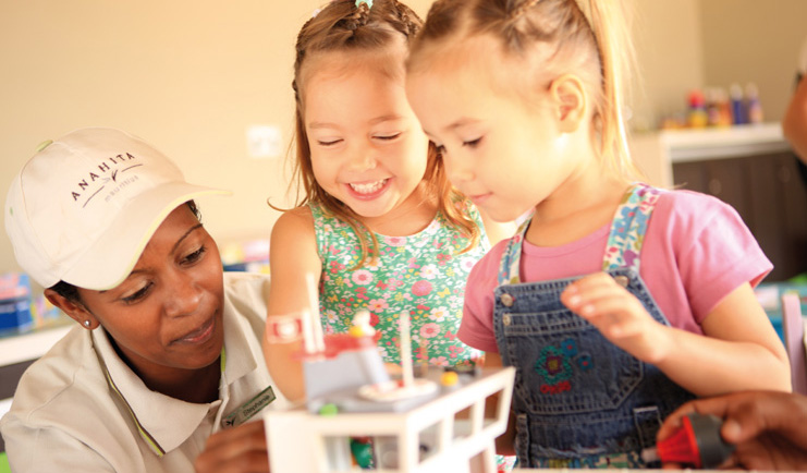 Anahita Mauritius kids club little girls playing with kids' club supervisor