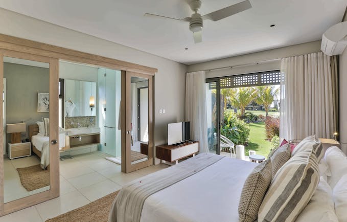 Anahita Mauritius prestige villa master bedroom bed en suite bathroom garden views