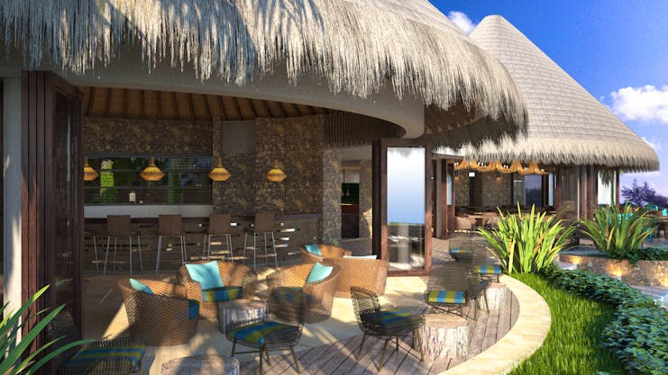 Seafood bar with chairs and tables set up beneath a beach hut style roof 