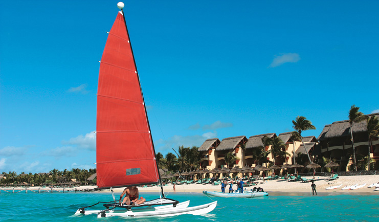 Constance Belle Mare Plage Mauritius water sports kayaks boats yachts on the water and beach