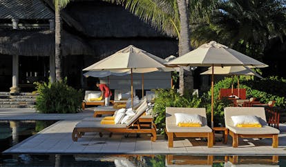 Constance Le Prince Maurice Mauritius loungers poolside umbrellas