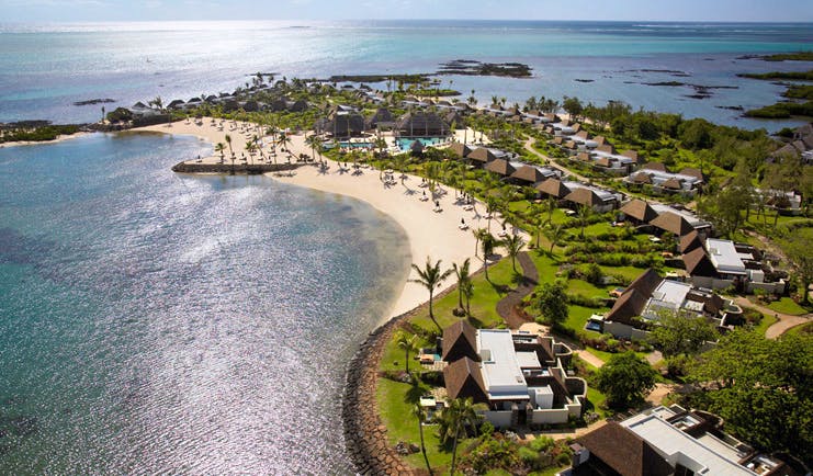 Four Seasons Mauritius aerial view bungalows palm trees lawns beach ocean view