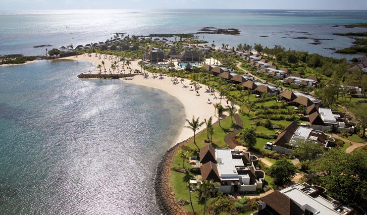 Four Seasons Mauritius aerial view bungalows palm trees lawns beach ocean view