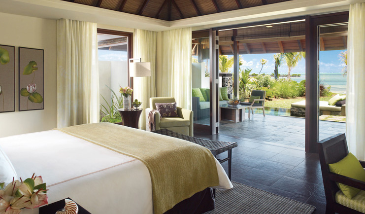 Four Seasons Mauritius bedroom modern decor patio area with sofa and ocean view
