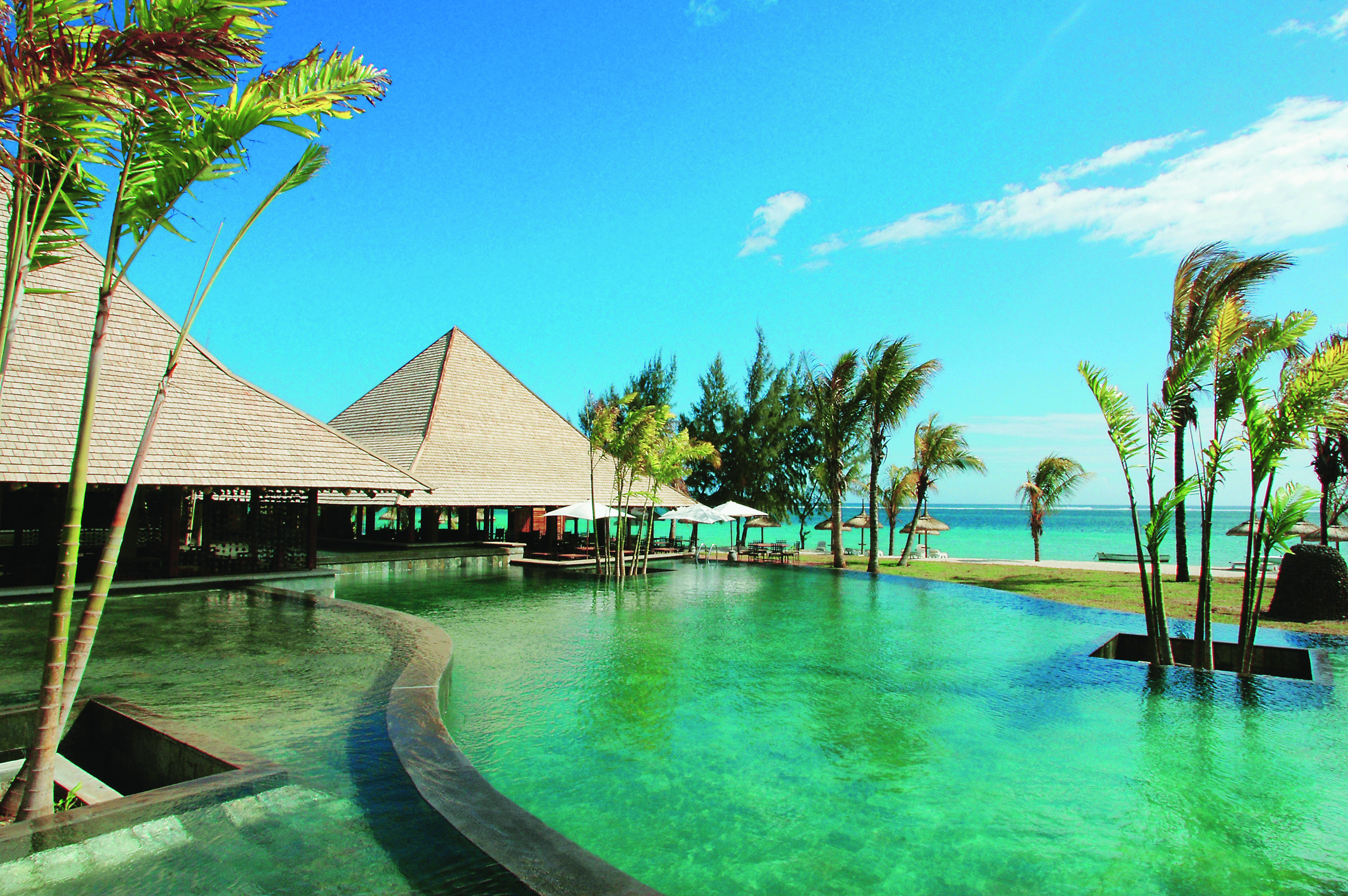 Heritage Awali Mauritius Amafrooty restaurant infinity pool dining pavilion ocean view
