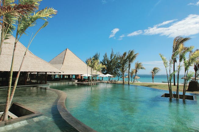 Heritage Awali Mauritius Amafrooty restaurant infinity pool dining pavilion ocean view