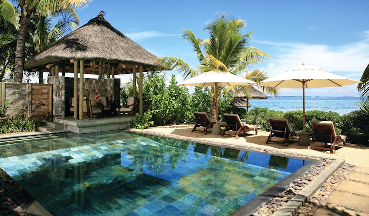 Heritage Awali Mauritius beach villa exterior private pool terrace overlooking beach