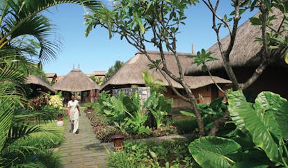 Heritage Awali Mauritius spa exterior huts with wicker roof gardens and pathways