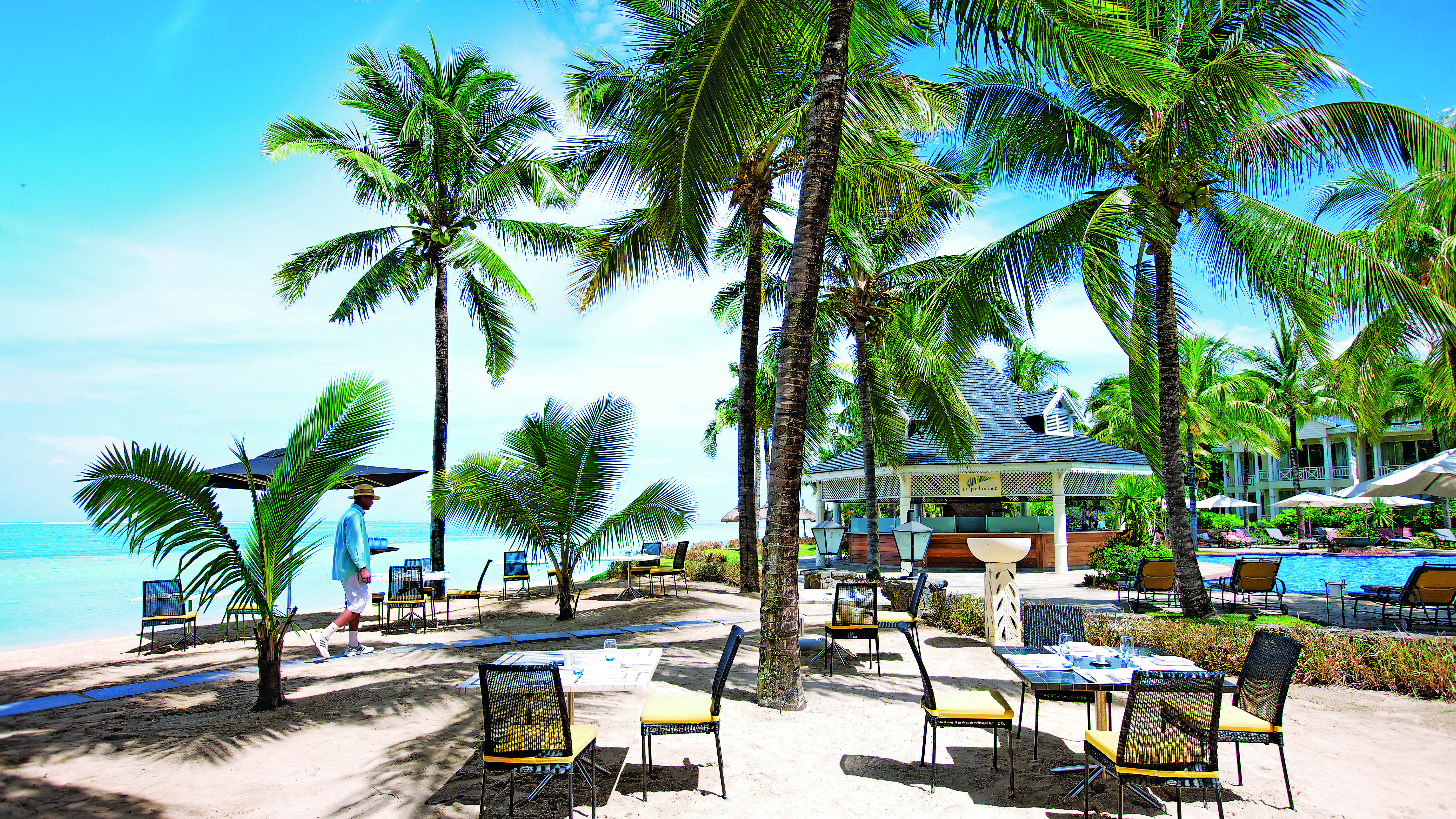 Le Telfair Mauritius beach dining outdoor seating palm trees