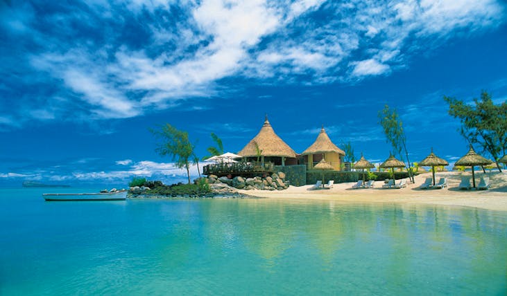 Lux Grand Gaube Mauritius beach white sands clear blue water sun loungers umbrellas