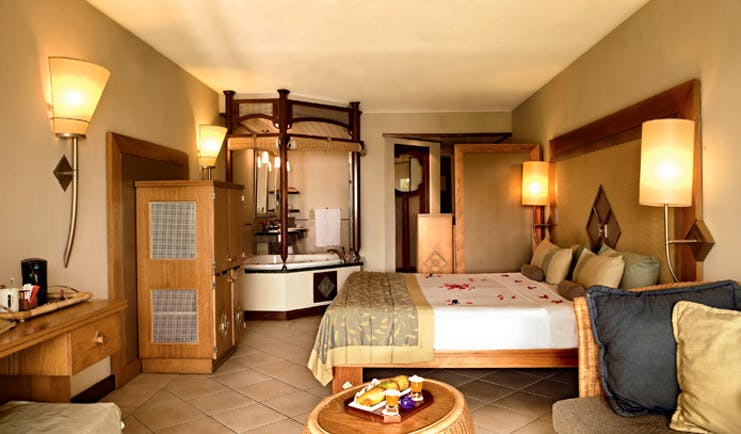 Lux Grand Gaube Mauritius superior guestroom bed sofa modern décor