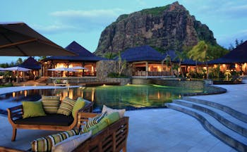 Lux Le Morne Mauritius pool mountain in background poolside seating