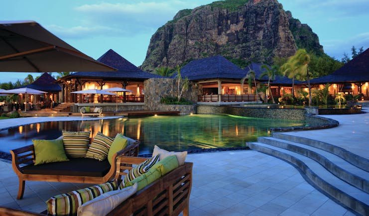 Lux Le Morne Mauritius pool mountain in background poolside seating
