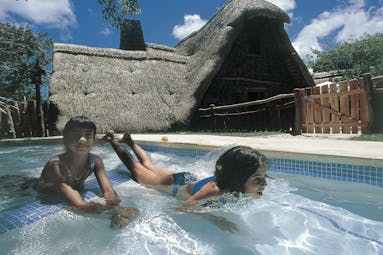Shangri La Le Touessrok Mauritius kids pool two young girls in small pool