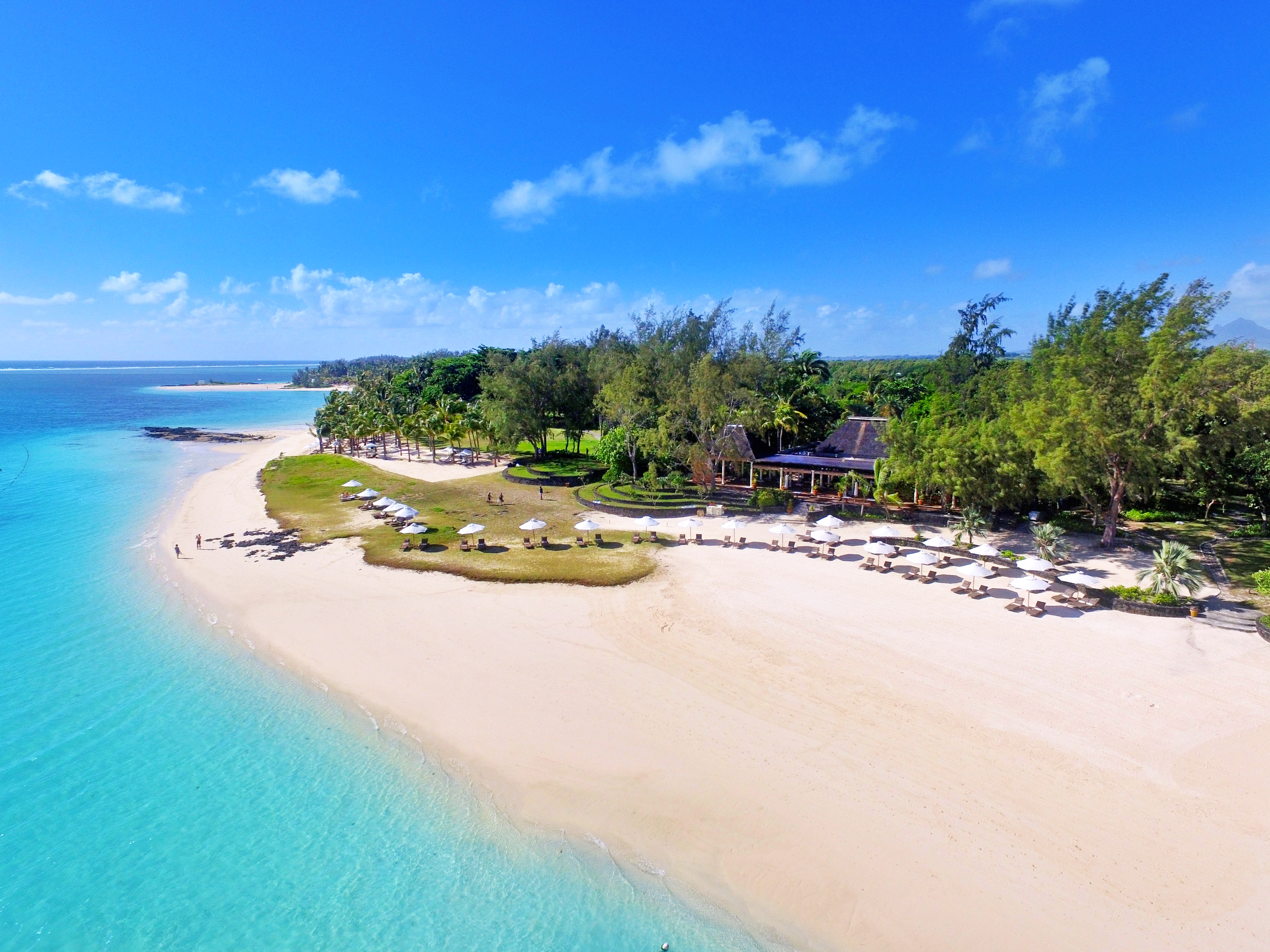 Aerial beach view with sun loungers  on the sand 