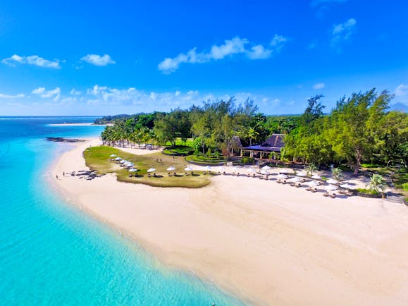 Aerial beach view with sun loungers  on the sand 