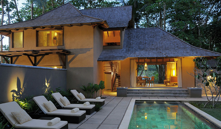 Constance Ephelia Resort Seychelles beach villa exterior yellow building sun loungers pool terrace