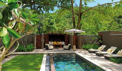 Constance Ephelia Resort Seychelles beach villa pool lawn pool loungers seating area forest views