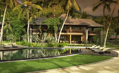 Constance Ephelia Resort Seychelles hotel exterior gardens palm trees outdoor pool