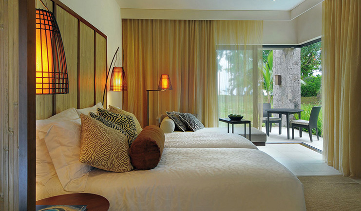 Constance Ephelia Resort Seychelles junior suite modern decor patio garden view