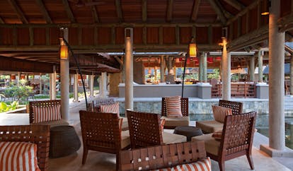 Constance Ephelia Resort Seychelles pool terrace seating area outdoor dining 