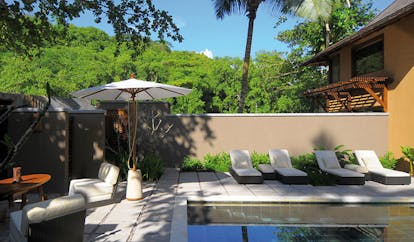 Constance Ephelia Resort Seychelles private pool sun loungers lounge area