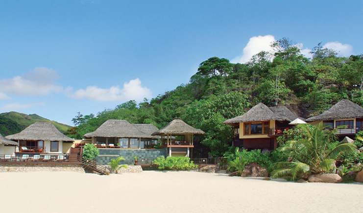 Constance Lemuria Seychelles bungalow beach thatched roofed villas forests