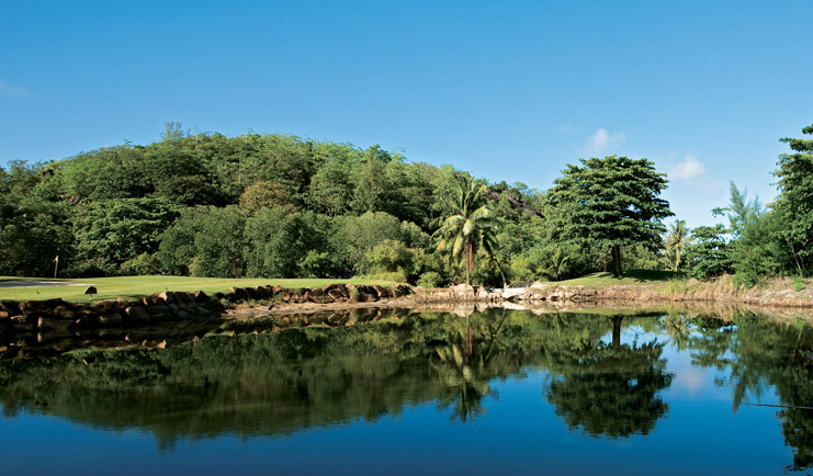 Constance Lemuria Seychelles golf course water trap palm trees