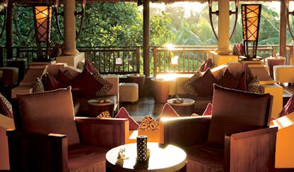 Constance Lemuria Seychelles main bar pavilion armchairs forest view