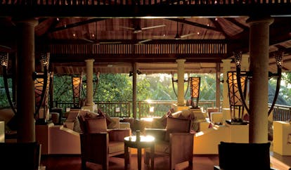 Constance Lemuria Seychelles main bar covered pavilion seating area forest view