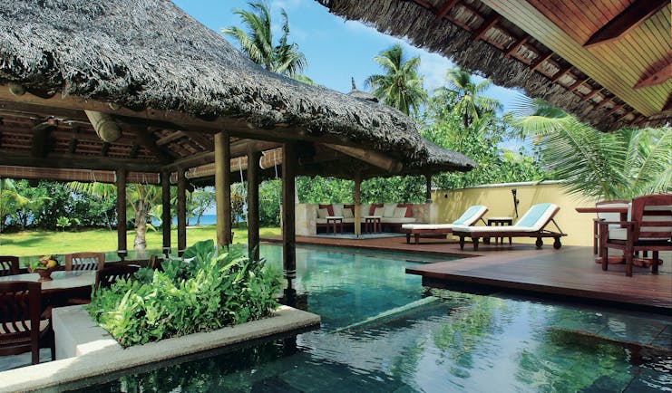 Constance Lemuria Seychelles villa garden private pool dining area loungers garden ocean view