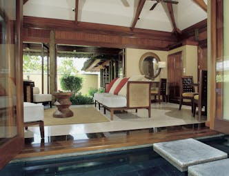 Constance Lemuria Seychelles villa lounge sofas stepping stone into pool