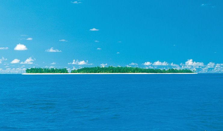 Denis Island Seychelles ocean view of island with trees