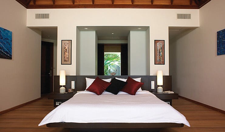 Hilton Labriz Seychelles beach villa bedroom modern decor and artwork