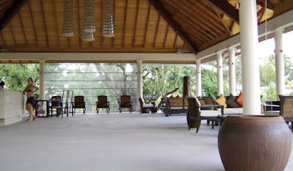 Hilton Labriz Seychelles reception covered pavilion seating area reception desk