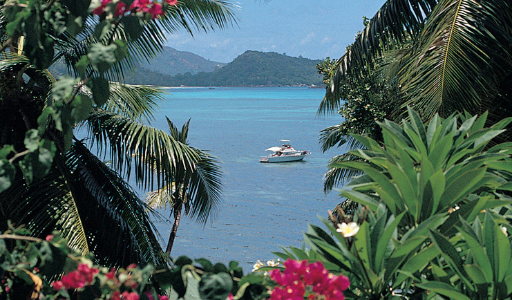 Hotel L'Archipel Seychelles ocean view flowers boat