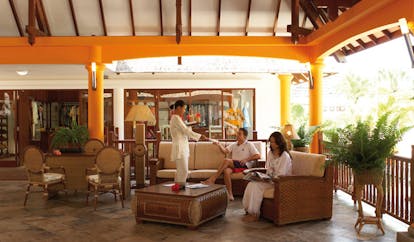 Domaine de la Reserve Seychelles outdoor lounge covered pavilions seating area drinks